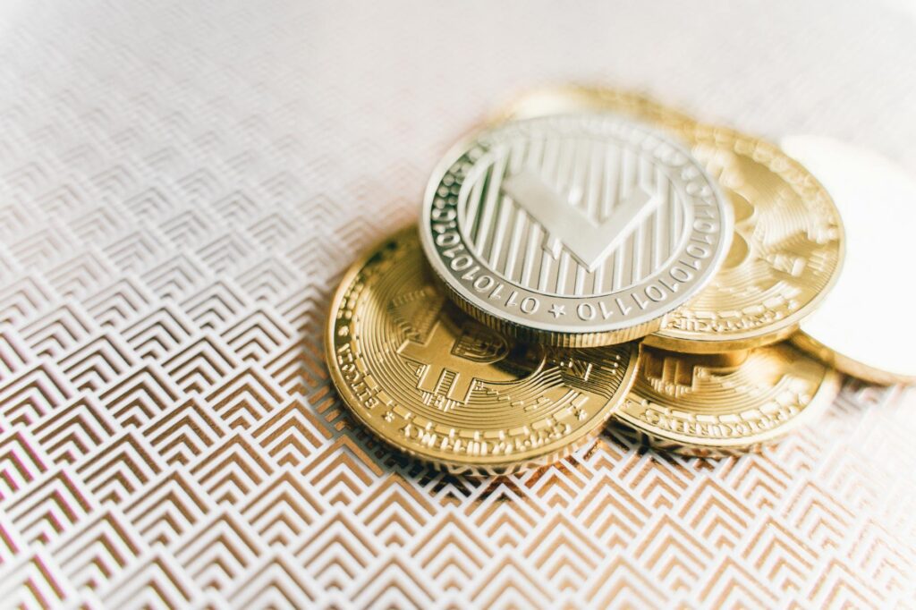 stack of golden bitcoins in close up photography