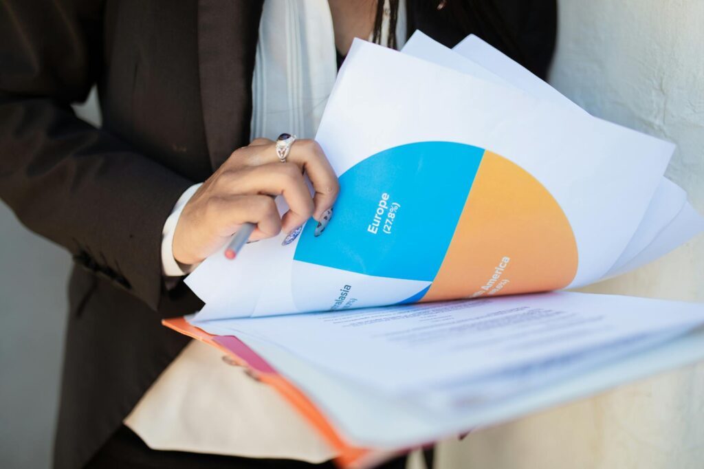 a person holding documents